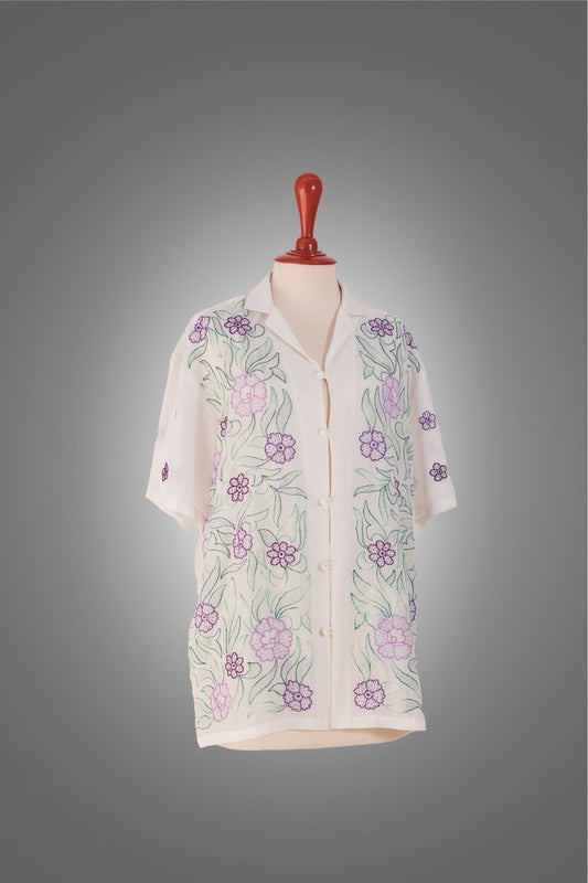 "Jungle Mein Bahaar" White Floral Embroidered Shirt on mannequin